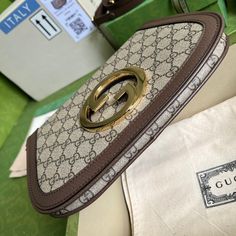 Coming from the House's archives, a round shaped version of the Interlocking G logo is reintroduced for Gucci Love Parade. Crafted from emerald green leather, this shoulder bag is completed by a delicate chain strap, infusing this accessory with a refined feel. Gold-toned hardware Round Interlocking G Leather shoulder strap with 15.4" drop Magnetic closure Small: 11"W x 6.3"H x 1.6"D Made in Italy Delivery 5-8 or 10-15 working days Please note that during high season and Sale period, delivery times may be affected We accept payment with a Credit card, Debit card, or PayPal.Note: Our Items are totally New High quality Brand Inspired Refurbished. Please make sure you are well aware of it before buying any of the Item. T&C's Apply in case of refunds.Please send us message on below chat to con Luxury Experience, Green Leather, Chain Strap, Gucci Bag, Real Leather, Luxury Bags, Contact Us, Fashion Bags, Paper Bag