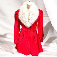 Size Medium……New With Tag……Retail $119 I have Available a Stunning Sugar Thrillz belted coat that has a Red twill construction, a quilted satin Red lining, a removable faux fur collar, Gathered shoulder sleeves, and pockets with snap closures. 98% Cotton 2% Elasthane Self Fabric 2: 100% Polyester. Dry Clean Only. 23205204 *****All photos are taken by and property of Trimzz. Please ask any questions Before Purchase as all sales are Final. All items are shipped from my Smoke, Pet, and Perfume Free Location. Please make sure your address is correct before purchase if your package is returned to me for incorrect address buyer is responsible for addition shipping charges to re send item. Thank You for Reading Trimzz Fitted Collared Party Outerwear, Fitted Collared Outerwear For Party, Red Fitted Collared Outerwear, Red Fitted Outerwear With Faux Fur Trim, Fitted Red Outerwear With Faux Fur Trim, Twill Coat, Sugar Thrillz, Belted Coat, White Fur