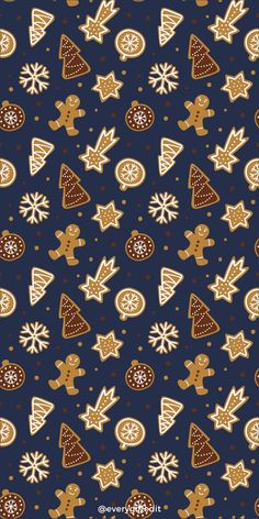 a blue background with ginger cookies and christmas trees