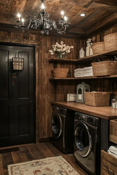 a washer and dryer in a room with wood paneling on the walls