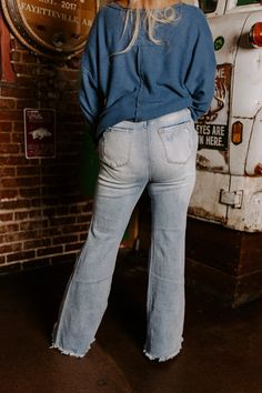 - These flares are a perfect stylish update for your denim collection! - Unlined, stretchy denim material with subtle fading and distressed detail - A waistline with belt loops, a hidden zip fly, and button closure - A functional four pocket cut - A figure flattering silhouette that ends in unfinished flared hemlines with frayed detail Denim Collection, Denim Material, High Waist, High Waisted, Luxury Fashion, Fashion Trends