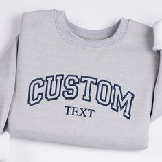 Custom Embroidered Crewneck, Embroidery Crewneck, Custom Embroidery, Personalized Sweatshirt, Embroidered Sweatshirt, Gift for Mom, Gift for Dad, Gift for Grandpa, Gift for Grandmar Ideal for any situation, a unisex heavy blend crewneck sweatshirt is pure comfort. These garments are made from polyester and cotton. This combination helps designs come out looking fresh and beautiful. The collar is ribbed knit, so it retains its shape even after washing. There are no itchy side seams on these sweat Sporty Embroidered Crew Sweatshirt, Crew Neck Hoodie With Embroidered Logo For College, Sporty Cotton Sweater With Embroidery, Sporty Embroidered Cotton Sweater, Cotton Embroidered Sweater, College Crew Neck Sweater With Letter Embroidery, Crew Neck Sweatshirt With Letter Embroidery For College, Sporty Crew Neck Hoodie With Custom Embroidery, Varsity Crew Neck Sweatshirt With Custom Embroidery