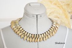 African shell necklace cowrie shell jewelry collar necklace handmade jewelry cowrie sea shell tribal accessories African fashion gift PRODUCT SPECIFICATIONS: Necklace length - 44.0 cm. Length downwards - 3.5 cm. Materials - cowrie shells and beads ADDITIONAL INFORMATION New and unworn: Yes Handmade in Kenya: Yes Other jewelry in my shop: https://www.etsy.com/shop/shakava Unique Handmade Cowrie Shell Necklace, Whale Carving, Cowrie Shell Jewelry, Bff Necklaces, Shell Necklace, Shell Jewelry, Cowrie Shell, Collar Jewelry, Shell Necklaces