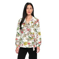 This blouse from Guillaume is effortlessly playful with it's multi color floral print and fresh details. It's made of lightweight woven fabric with a slight crepe texture. Ruffles decorate the surplice neckline as it wraps around and ties on your left side. Long cuffed sleeves add a flowy finishing touch on this supremely stylish top! Floral Print V-neck Tops For Work, Versatile Multicolor Tops For Spring, Spring Tie Waist Tie Neck Top, Spring Tops With Tie Waist And Tie Neck, Printed Tie Neck Tops For Work, Spring Surplice Neckline Faux Wrap Top, Versatile Floral Print Spring Tops, Chic Spring Blouse With Surplice Neckline, Fitted Floral Print Wrap Top