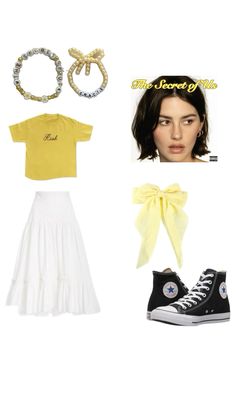 a woman in yellow shirt and white skirt with black converse shoes, bracelets and hair accessories