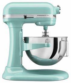 an aqua blue mixer on a pink and orange background