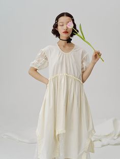 Knee-length Cotton Ruffled Skirt, Asymmetrical Hem Lined Dresses, Relaxed A-line Spring Dress, Asymmetrical Gathered Skirt Dress, Cotton Midi Skirt With Ruffles, Spring Gathered Asymmetrical Dresses, Spring Skirt With Unfinished Hem, Spring Knee-length Skirt With Ruffle Hem, Spring Dress With Relaxed Fit And Asymmetrical Hem