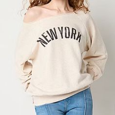 Arizona Juniors Womens Long Sleeve Sweatshirt “New York” This Oversized Junior's And Women's New York Graphic Sweatshirt Is Made From Soft Cotton-Knit With A Raw Cut Off-The-Shoulder Neckline And Long Sleeves. Wear It Layered Over A Button-Down With Jeans Or As A Standalone With Leggings. Features: Banded Bottom Closure Type: Pullover Head Fit: Loose Fit Sleeve Length: Long Sleeve Sleeve Style: Off Shoulder Sleeve Fiber Content: 60% Cotton, 40% Polyester Size: Xxl Color: Oatmeal Brand New With T Beige Relaxed Fit Sweater With Letter Print, Oversized Cream Top With Letter Print, Beige Letter Print Top For Loungewear, Oversized Beige Letter Print Sweater, Oversized Beige Sweater With Letter Print, Beige Long Sleeve Top With Letter Print, Cozy Beige Sweatshirt, Cream Tops With Letter Print For Winter, Cream Winter Top With Letter Print