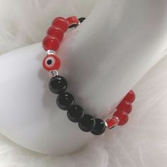 Crimson Gaze Crystal Gemstone Evil Eye Bracelet with Evil Eye Beads, Glass Seed's Beads, red and black Crystal Gemstone Beads. Evil Eye Beads, Eye Beads, Eye Bracelet, Evil Eye Bracelet, Black Crystals, Crystals And Gemstones, Red And Black, Evil Eye, Gemstone Beads