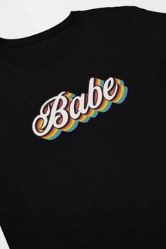 a black t - shirt with the word babe on it