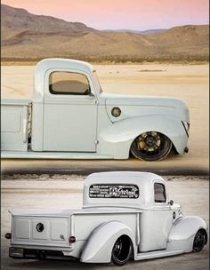 an old white pickup truck parked in the desert