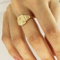 Star Signet Ring 14k Solid Gold Celestial Ring Gold Square Signet Ring Handmade Jewelry Minimal Ring Christmas Gift For Her Birthday Gift ▶ 𝙋𝙍𝙊𝘿𝙐𝘾𝙏 𝙁𝙀𝘼𝙏𝙐𝙍𝙀𝙎 * 14k Solid Gold Ring * Ring Length : 1.14 cm ( 0.44 inches) * Ring Width : 1 cm ( 0.39 inches) ❤️ This ring will look amazing on your graceful fingers! It will make you look more stylish with its sparkle and eye-catching.We are sure it will suit you very well! ❤ ❤️ A quality design that will amaze you with its shine that you Rose Gold Sterling Silver Rings With Single Cut Diamonds, Promise Signet Ring With Diamond Accents, Luxury Gold Birthstone Ring For Promise, Fine Jewelry Rose Gold Rings Stamped 14k, Luxury Gold Birthstone Promise Ring, Dainty Gold Diamond Signet Ring, Luxury Rose Gold Rings Stamped 14k, Rose Gold Diamond Signet Ring In Fine Jewelry Style, Dainty Yellow Gold Diamond Signet Ring