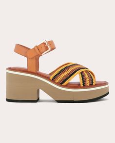 Set atop a chunky-yet-lightweight platform sole, the Carya sandal features colorfully crocheted straps that cross over each other at the forefoot. Anchored by genuine leather, a metal buckle at the ankle creates a secure fit. Buckle closure Crocheted straps Upper: 100% fabric Lining: 100% lamb leather Outsole: 100% elastomer Clean with soft brush Made in France Size & Fit Fits true to size Crochet Size, Metal Buckles, Platform Sandals, Made In France, Mango, Genuine Leather, Buckle, Sandals, France