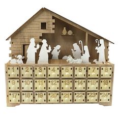 a wooden nativity scene with the birth of jesus