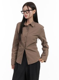 Product Detail Style : Casual, Minimal Occasion : Work wear Detail : Buttoned, Strap Print : Solid Material : Cotton Sleeve : Long sleeve Neck : Collar Cotton100 Color : Brown, White, Black Made in Korea Model Size Model is wearing size S/M and the color Brown. Height : 5'5" | 165cm / Top : S / Bottom : S (26 inch) .prddescription table, .prddescription td, .prddescription th { border : 1px solid black; border-collapse : collapse; padding: 10px; } Size(Inch) Size Shoulder Bust Sleeve Length Armh Casual Slim Fit Blouse For Business Casual, Casual Brown Blouse For Office, Casual Long Sleeve Slim Fit Blouse, Casual Brown Office Blouse, Brown Cotton Blouse For Work, Brown Cotton Workwear Blouse, Brown Long Sleeve Office Top, Casual Brown Top For Office, Casual Brown Office Top