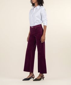 Rock a vintage-chic look in high rise, full-length flare jeans made from soft corduroy finished with raw hems in a rich hue and our fab ab front pockets that smooth and add comfort. Fabric: 98% Cotton, 2% Spandex Size & Fit: Inseam: 29", Leg Opening: 23", Rise: 10 1/2" Color: MULBERRY Styled with: Millia Front Crop Shirt (KT134501) Statement Jeans, Corduroy Coat, Boyfriend Shorts, Denim Coat, Linen Shorts, Colored Denim, Wide Leg Denim, Cropped Denim, Sweater Blouse