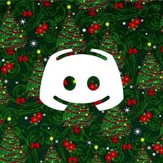 a green and red christmas pattern with a white face