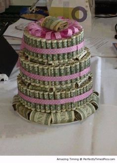 a stack of money sitting on top of a table