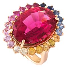 13.15 Carat Pink Tourmaline (Rubellite) surrounded by colored Sapphire on Pink Gold 18K Ring. Dimensions: approx. 2.60 centimeters x 2.20 centimeters. Total weight: 14.09 grams. Ring Size: 53 / 6.5 US. Ring Rosegold, Pink Tourmaline, Pink Gold, Or Rose, Pink And Gold, Fashion Rings, Tourmaline, Ruby, Jewelry Rings