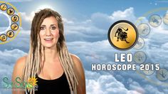 a woman with long dreadlocks standing in front of an advertisement for libra horoscope 2013