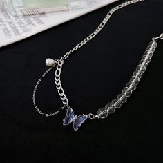 Embrace the beauty and symbolism of the butterfly with our Purple Butterfly Necklace. Made from titanium steel and glass beads, this necklace features a stunning butterfly pendant that's sure to make a statement. The purple color adds a touch of elegance and sophistication to any outfit, making it the perfect accessory for any fashion-forward individual. At a length of 45cm + extend 5cm, this necklace is both comfortable and stylish. And for a limited time, you can buy 3 necklaces and pay for 2 Trendy Silver Butterfly Necklace, Butterfly Shaped Beaded Chain Jewelry Gift, Silver Beaded Butterfly Necklace, Butterfly Shaped Beaded Chain Jewelry For Gifts, Trending Necklaces, Buy Necklace, Handmade Wire Jewelry, Necklace Beaded, Outfit Making