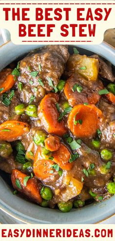 beef stew with carrots and peas in a blue bowl