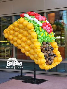 This is a photo of a balloon sculpture made to look like a taco. This was created for Microsoft on their Redmond Campus in July 2022, as part of a "Taco Tuesday" promotion. Taco Balloon Garland, Ballon Display, Balloon Party Ideas, Balloon Sculptures Diy, Rose Flowers Drawing, Balloon Stack, Ballon Ideas, Decoration Craft Ideas, Pot Drawing