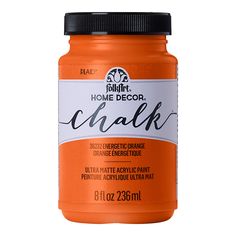 a jar of orange chalk paint on a white background