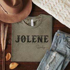 Wear your country music pride loud and proud with our Jolene You Can Have Him Western Graphic T-Shirt. This tee features the legendary country music hit from Dolly Parton, making it a must-have for any classic country music fan. Get your funny country tee today! SIZING:This is a true to size unisex shirt. Our customers are most satisfied with the size they normally wear in a women's size t-shirt.Small fits sizes 4-6Medium fits sizes 8-10Large fits sizes 12-14XLarge fits sizes 16-182XLarge fits s Cow Shirts, Classic Country Music, Funny Country, Teacher Quotes Funny, Country Tees, Cow Shirt, Music Hits, Cowgirl Shirts, Teacher Tees