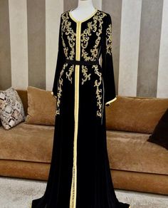 Moroccan Luxurious Black Velvet Caftan , Hand Beaded & Embroidered, Black Kaftan , Dubai Gown This item is made to order and can be customised. Elegant Black Gown With Dabka Work, Black Embroidered Long Sleeve Gown, Embroidered Evening Gown For Eid, Black Long Sleeve Embroidered Gown, Black Long Gown For Festive Occasions, Black Bollywood Long Sleeve Gown, Black Long Sleeve Bollywood Gown, Festive Black Long Gown, Black Bollywood Gown With Long Sleeves