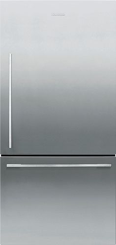 a silver refrigerator freezer sitting on top of a counter