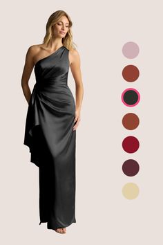 a woman in a long black dress with different colors