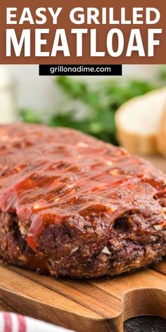 an easy grilled meatloaf on a cutting board with the title above it