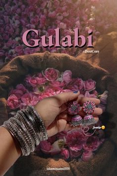 the cover of gulabi magazine with pink flowers and rings on it's hands