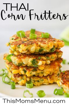 three corn fritters stacked on top of each other with the words thai corn fritters above them