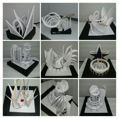 many different sculptures made out of white paper