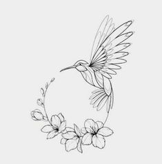 a hummingbird flying through the air with flowers in it's beak and wings