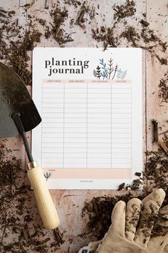 a planter's hand next to a calendar and gardening gloves