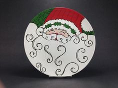 a white plate with a santa clause on it