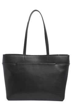 Sleek and slender, this timeless tote bag is an everyday go-to for storing essentials in a sophisticated manner. 10"H x 12.5"W x 6"D Interior zip pocket Structured silhouette with flat base and protective metal feet Lined Synthetic Imported 6 D, Nordstrom Rack, Black Silver, Zip Pockets, Calvin Klein, Nordstrom, Sleek, Tote Bag, Black