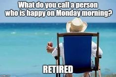 a man sitting in a chair on top of a beach next to the ocean holding an apple