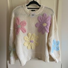 Nwt. Debut Sweater- Beige /Pastel Floral Sweater. Size S/M. Side Slits On Waistband. Cream Acrylic Sweater For Spring, Cute Beige Sweater For Spring, Trendy Pastel Sweater For Spring, Daisy Sweater, Pastel Sweater, Floral Sweater, Pastel Floral, Beige Sweater, Cute Bags