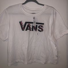 White Vans Shirt. Small Size. New Vans Cotton Tops For Spring, Vans White Relaxed Fit Tops, Vans Summer Graphic Tee Tops, Vans Graphic Tee For Summer, Vans Graphic Tee Tops For Summer, Vans Crew Neck T-shirt For Spring, White Graphic Print Top By Vans, White Short Sleeve Vans Tops, Vans Spring Crew Neck T-shirt