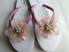 These beautiful white flip flops are hand wrapped in mauve satin ribbon, and adorned with a  handmade two tone organza flower with pearl pistils. Ribbon color is mauve, if you are needing other colors of ribbon or decoration please contact me and will be happy to accommodate you! All flip flops are handmade to order and the production time is 5-7 business days and then please allow additional time for shipping. Amazing for beach, weddings, flower girl or a fancy event, you choose! Please choose Silver Bridal Sandals, Beach Wedding Flip Flops, Bridesmaid Flip Flops, Bridesmaid Sandals, Custom Flip Flops, Bridal Flip Flops, Old Navy Flip Flops, Beautiful Slippers, Beach Wedding Sandals