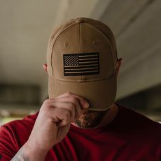 American Flag Hat PATRIOTIC STYLE The perfect hat to represent your undying pride in the United States. With a neutral hat color, you'll find that this hat matches all your favorite styles! From a backyard barbeque to a night out with the guys, this hat should definitely be added to your headwear collection! Featuring the United States Flag and the Grunt Style logo patch on the side, this hat is sure to help you rock your USA pride front and center no matter where you are. Grow your collection and shop all of Grunt Style's Hats now! Our Embroidered American Flag Hat is crafted with the following: Unisex Fit Sizing - M/L (One Size Fits Most) Structured, low profile cap with curved visor Canvas Fabric Plastic snapback closure Center front patch w/ embroidery Grunt Style Woven Label on Wearer Neutral Hats, Backyard Barbeque, American Flag Hat, Mom Graphic Tees, Mom Accessories, Usa Pride, Patriotic Fashion, Flag Hat, United States Flag