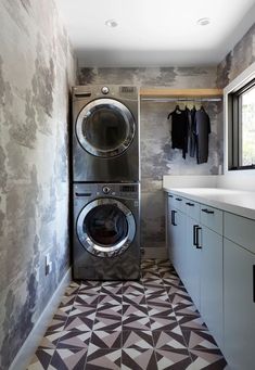 a washer and dryer in a small room