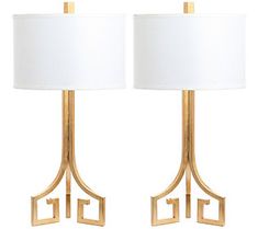 pair of gold metal table lamps with white shades