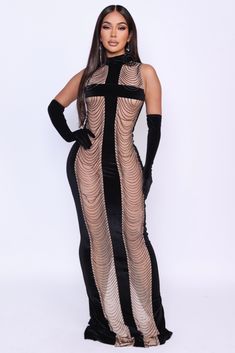 Indulge in the luxurious feel of the Velvet Demure dress. Made with soft velvet and delicate mesh, this long dress exudes elegance. The added chains give it a touch of edginess, while the included gloves complete the look. Elevate your style and make a statement with the Velvet Demure dress. Item has 3/5 stretch See through mesh areas **PLEASE NOTE ITEM HAS DELICATE CHAINS. CHAINS ARE PLACED ON WITH PROFESSIONAL ADHESIVE. CHAINS CAN FALL OFF, BUT NEVER ENOUGH TO CHANGE THE LOOK OF THE DRESS** Black Velvet Club Dress, Elegant Mesh Club Dress, Elegant Mesh Dress For Club, Sheer Winter Party Dresses, Sheer Dresses For Winter Party, Elegant Sheer Dress For Club, Winter Evening Dresses With Sheer Sleeves, Glamorous Evening Mesh Dress, Evening Dresses With Sheer Sleeves For Winter