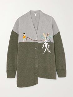 a cardigan sweater with an embroidered insect on the front and two small birds on the back