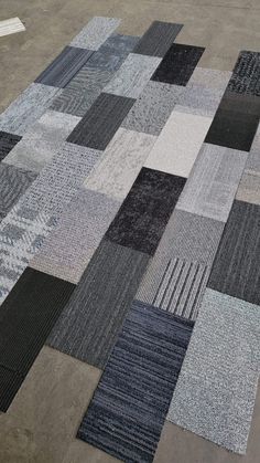 an area rug with different colored squares on it